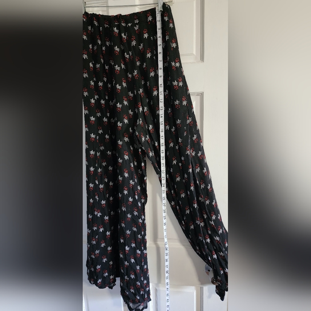 RAGA Multiprint. Wide legs Trousers. Drawstring pull on.